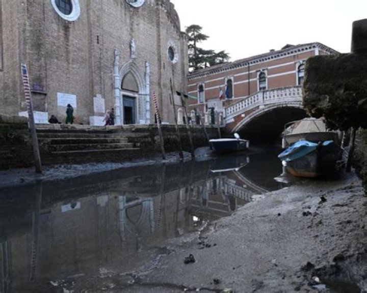Drought And Low Tides Cause Venetian Canals To Run Dry
