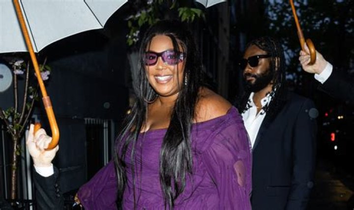 Lizzo All Smiles As She Attends Pre-Met Gala Dinner